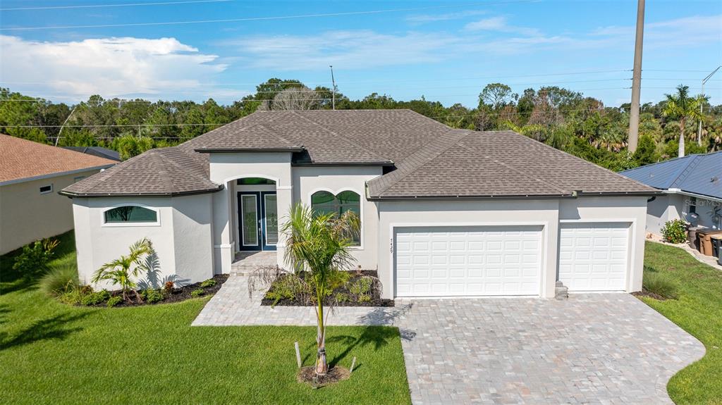 front view of a house with a yard