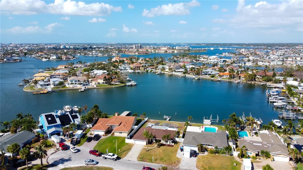 an aerial view of a house with a ocean view