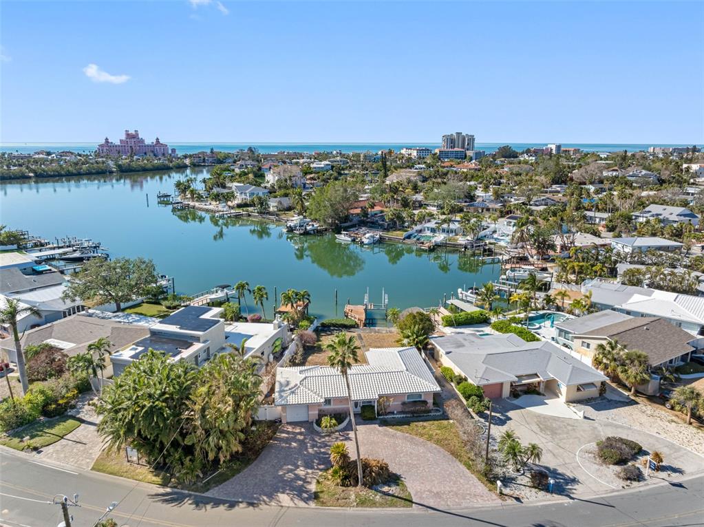 an aerial view of a house with lake view