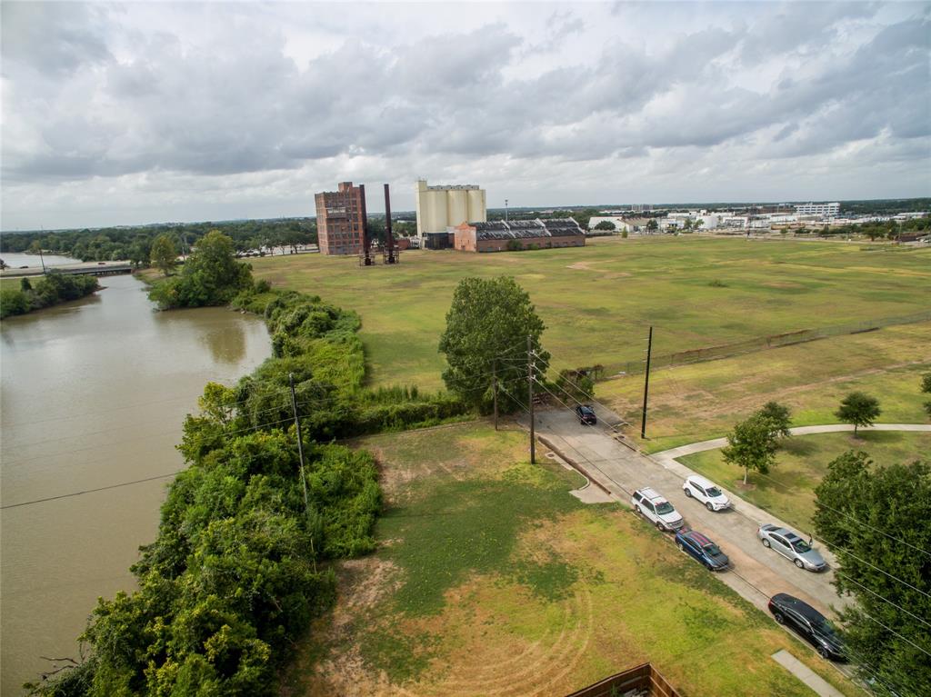 a view of a lake with a big yard