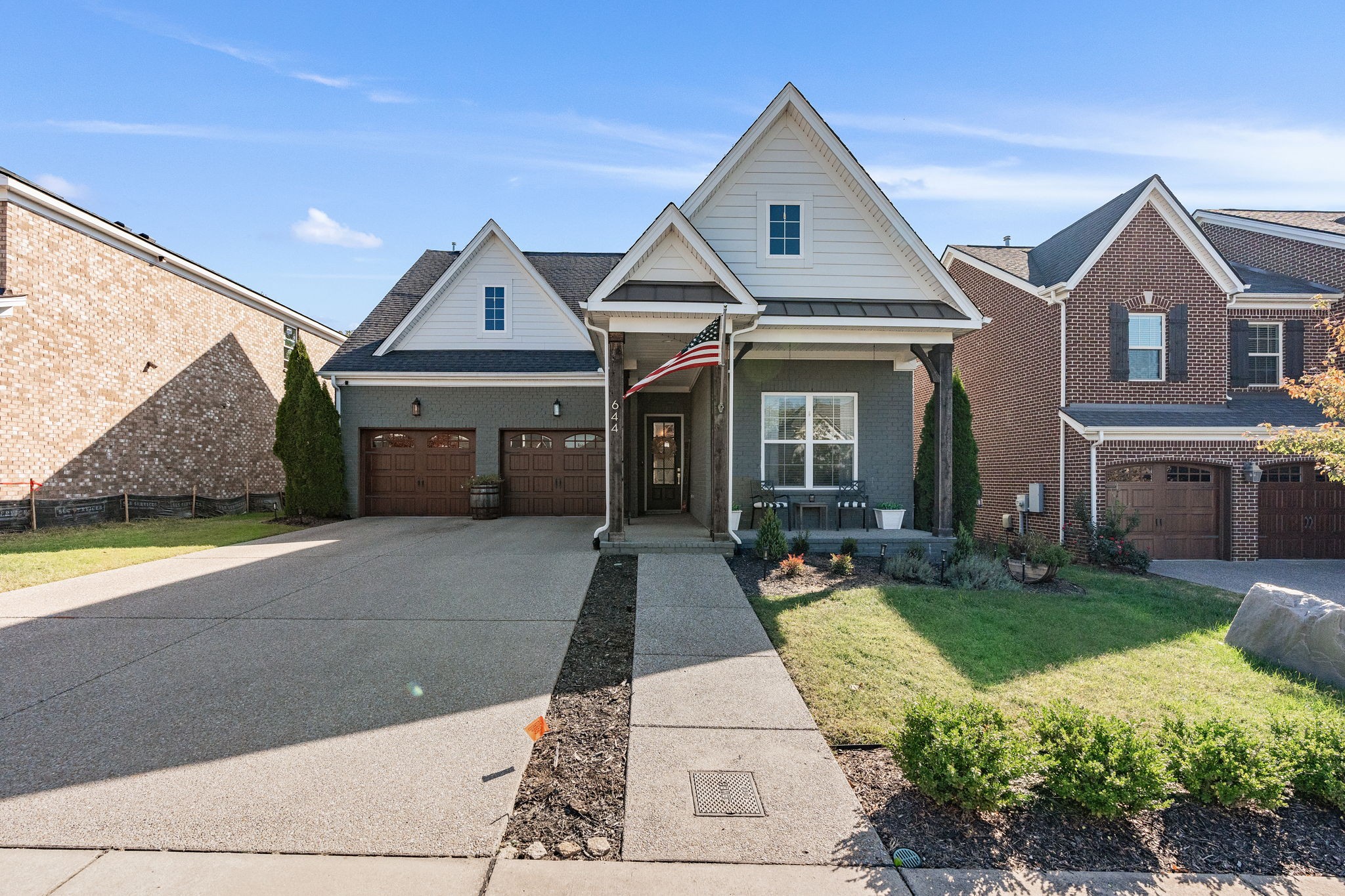 a front view of a house with yard