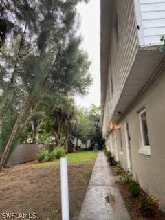 a view of a pathway that has an trees