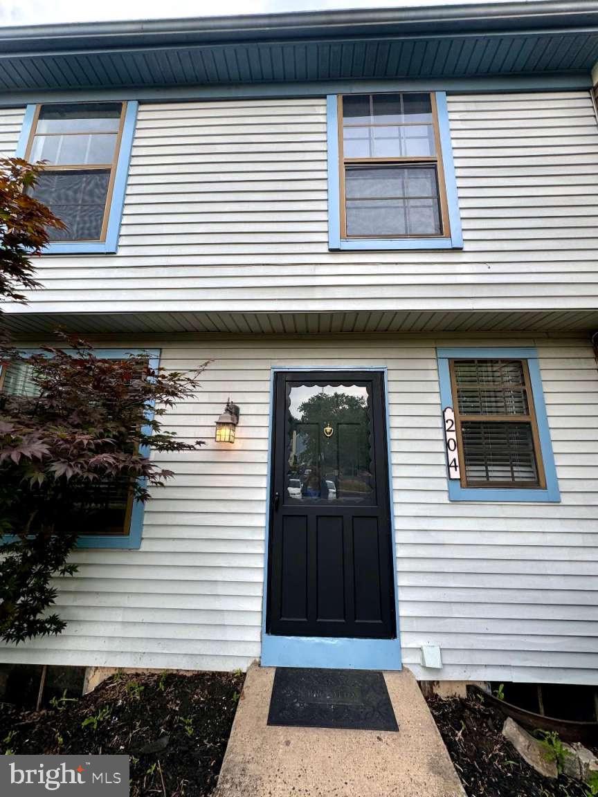 a view of a house with white door