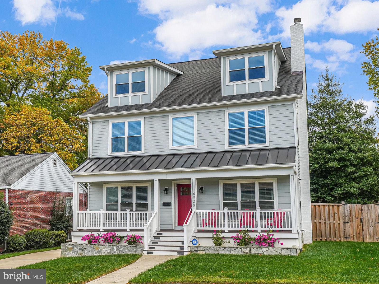 a front view of a house with yard