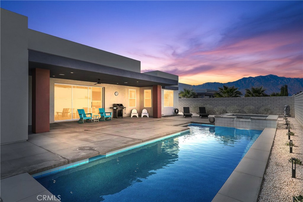 a view of a house with swimming pool