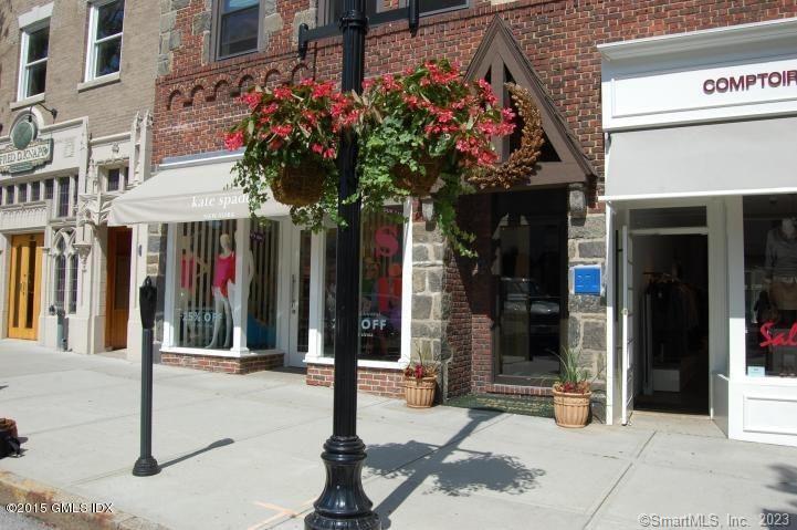 a view of street with sitting area