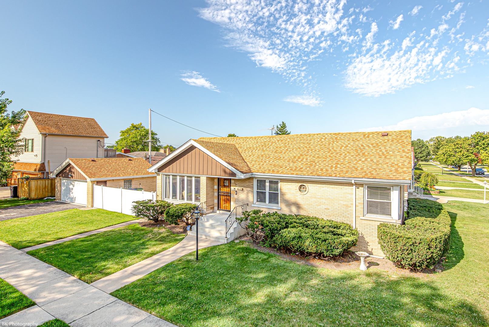 front view of a house with a yard