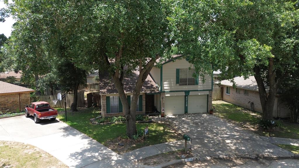 a front view of a house with yard