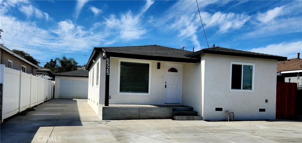 a view of a house with a large window