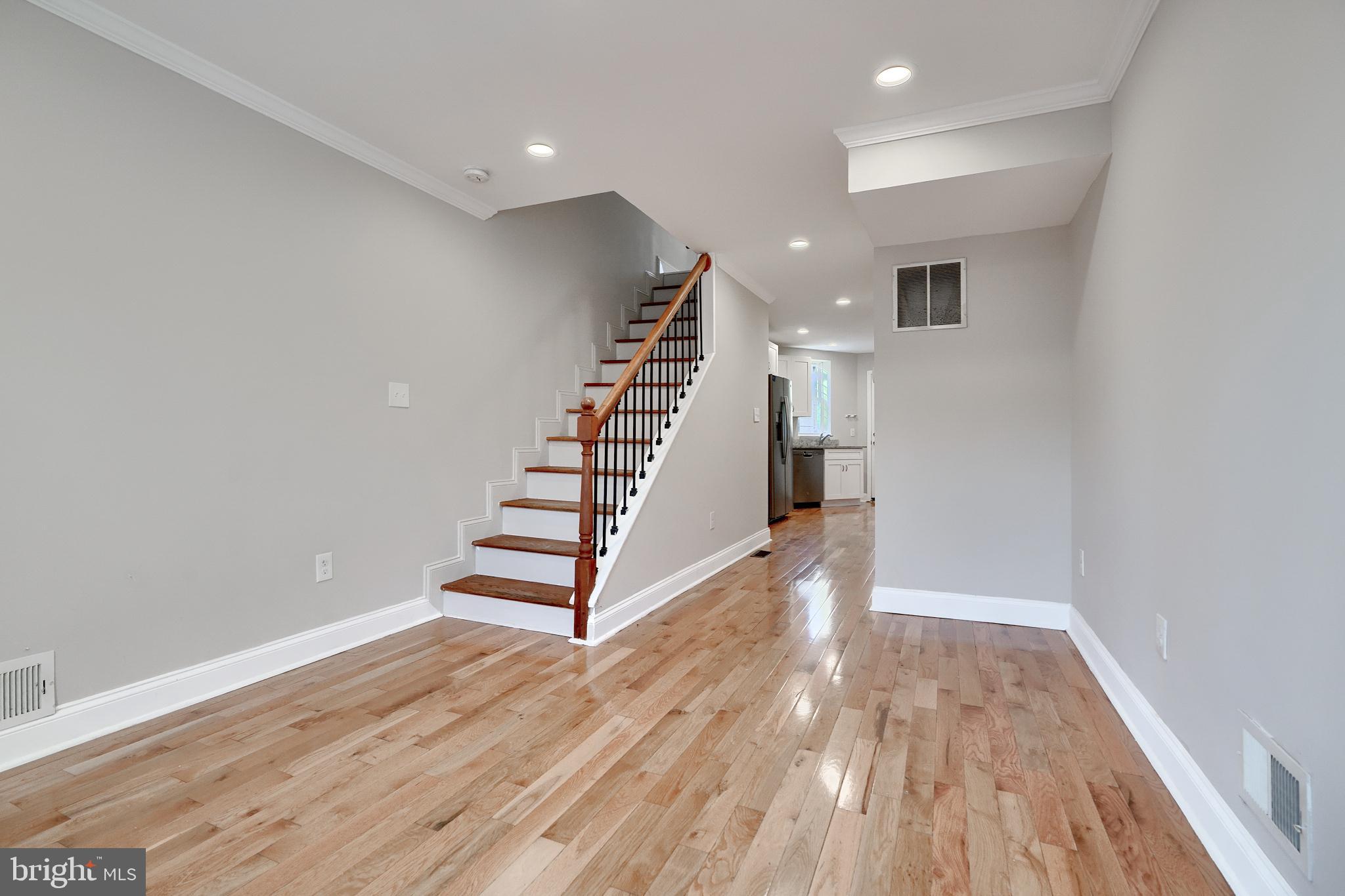 a view of entryway with wooden floor