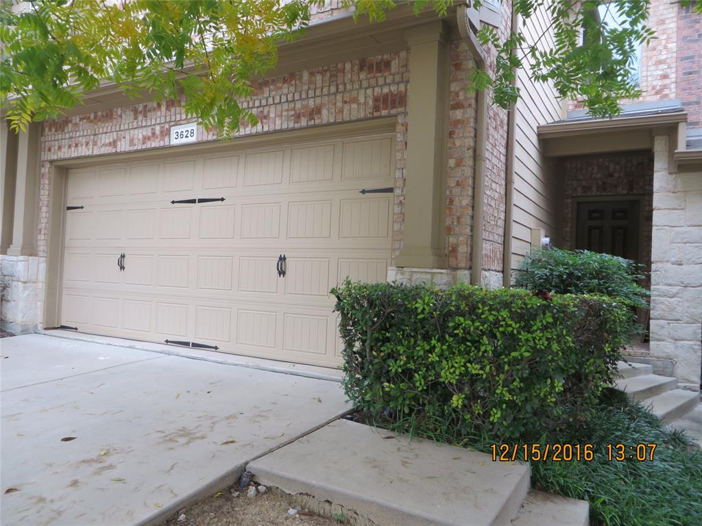 front view of a house with a trees