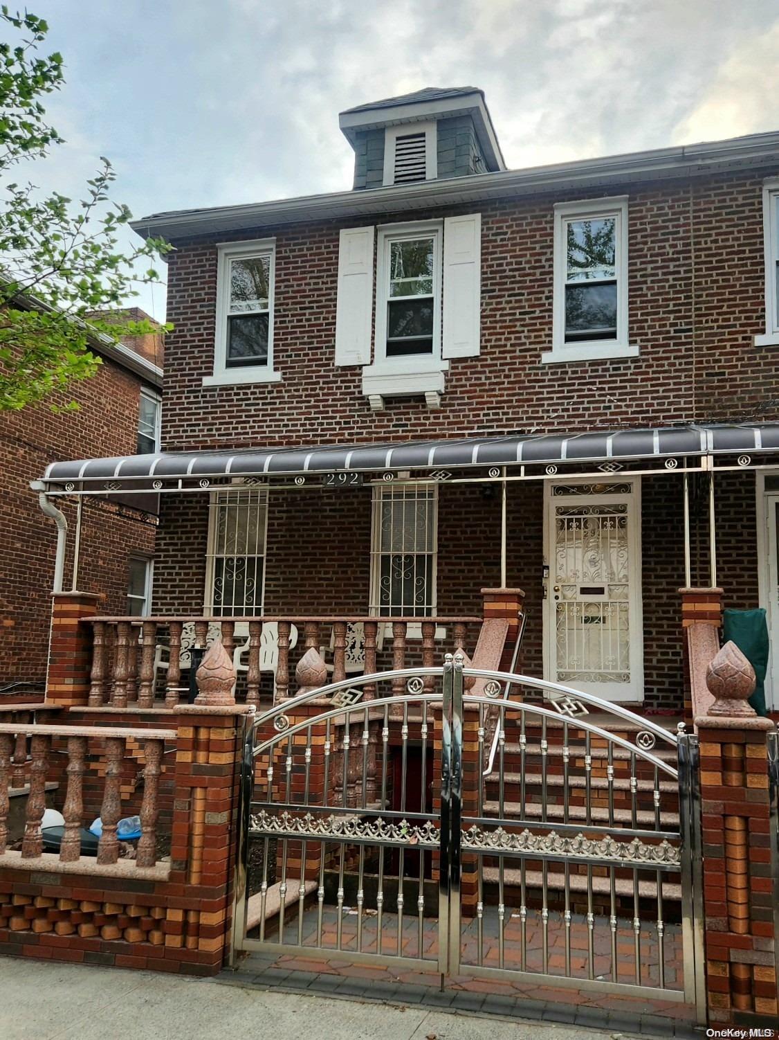 a front view of a house with balcony