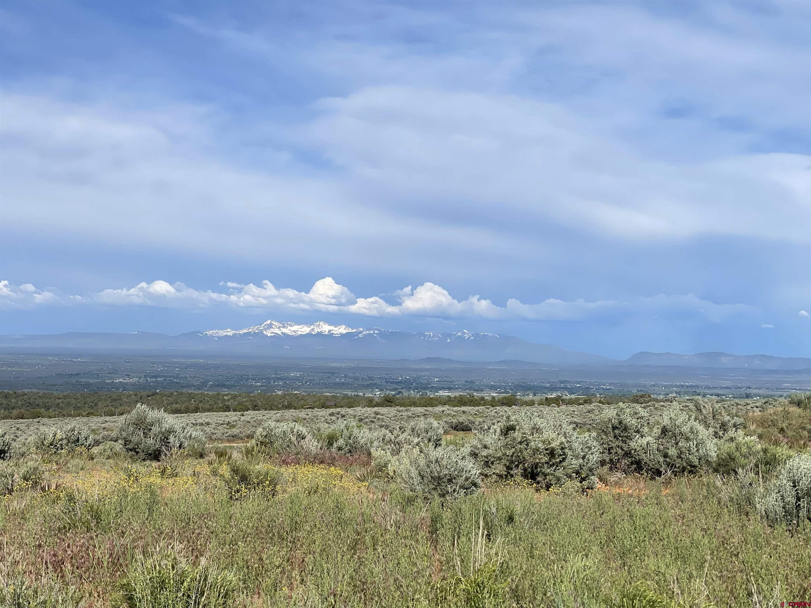 a view of an outdoor space and mountain view in back