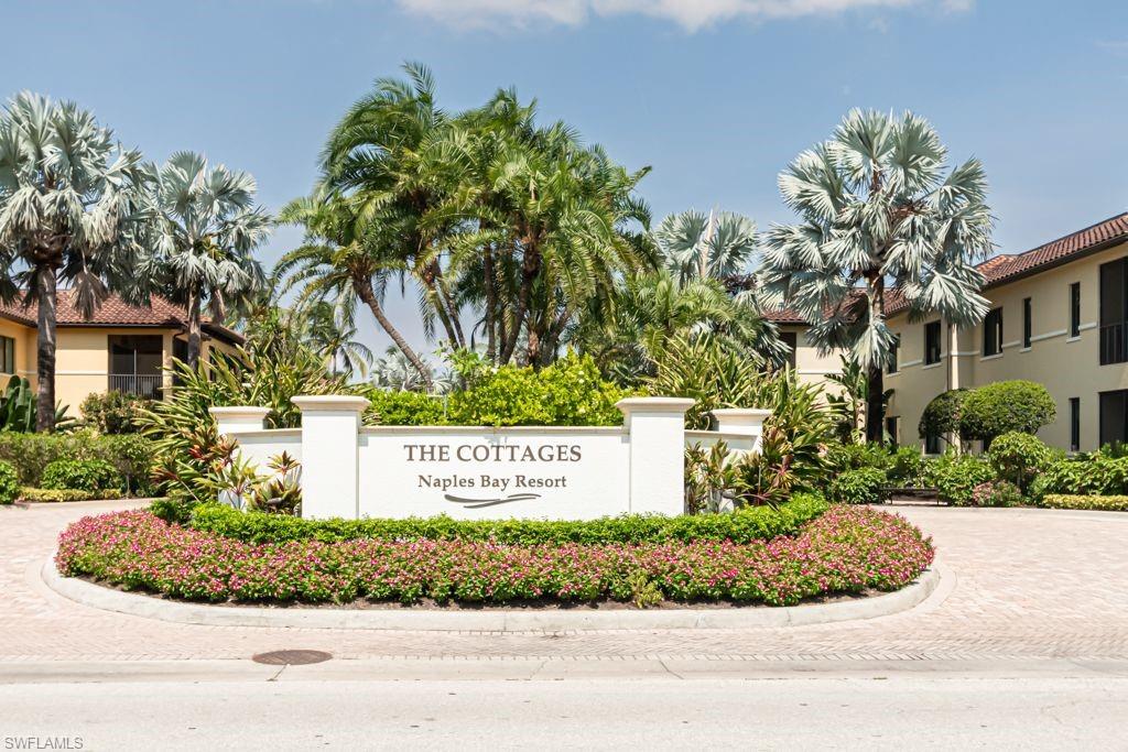 a view of a sign in front of house