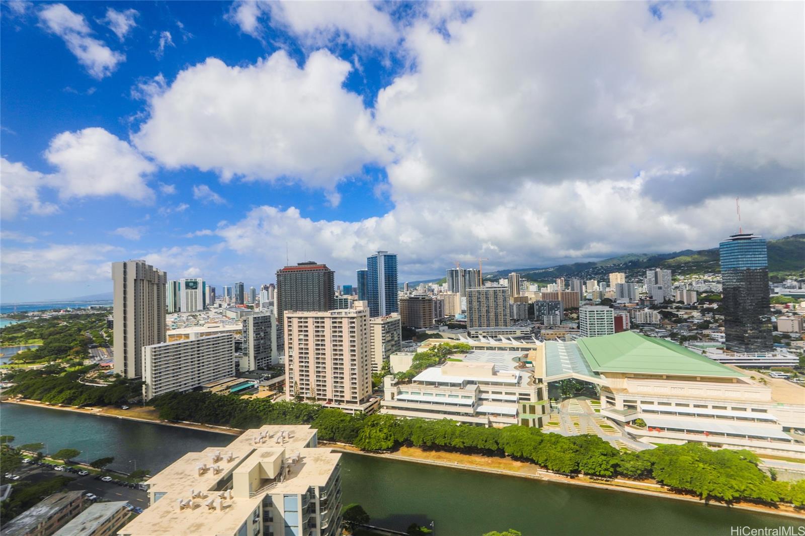 a view of a city with tall buildings