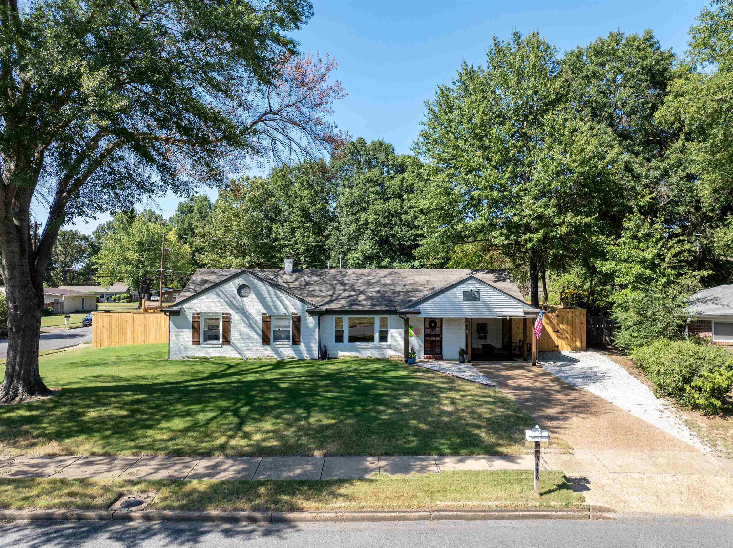 Ranch-style house with a front yard