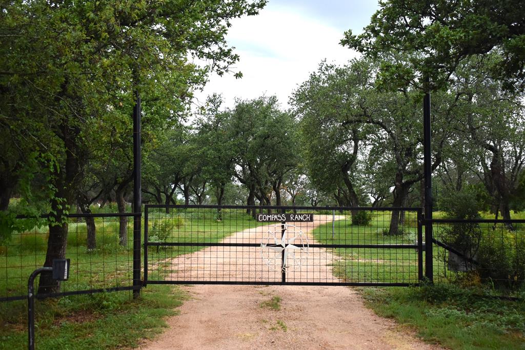 a view of park with fence