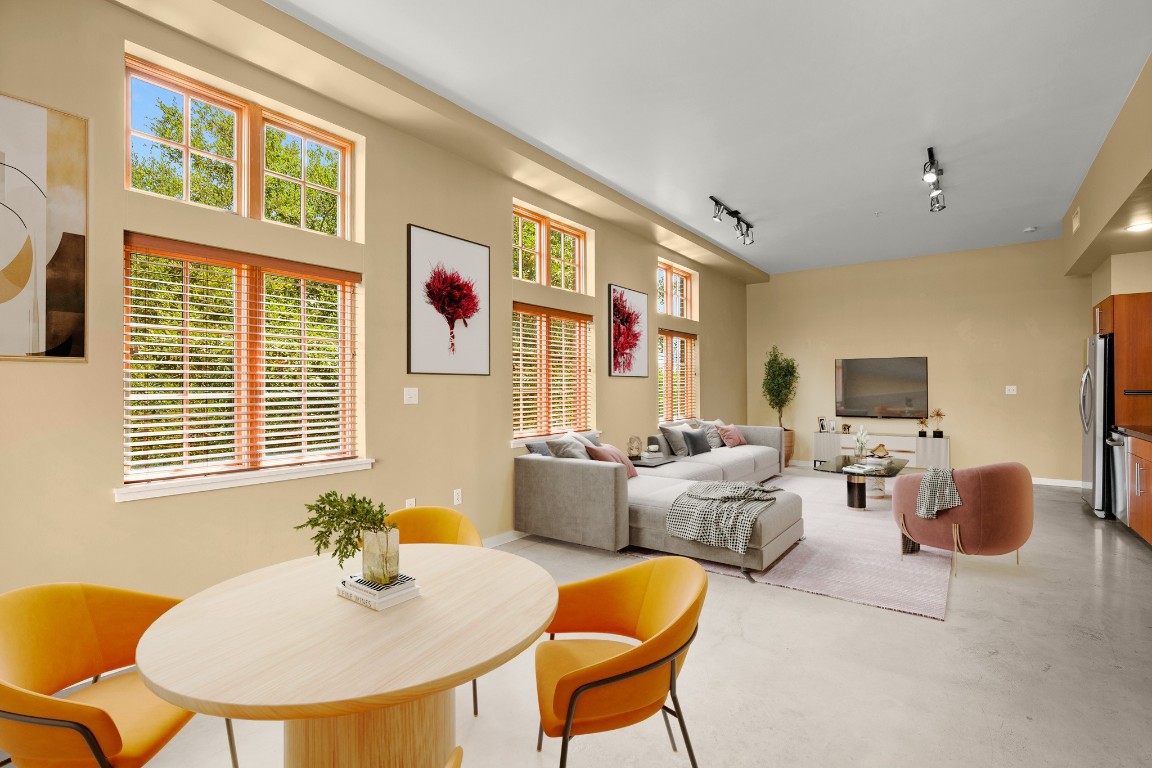 a living room with furniture and a window