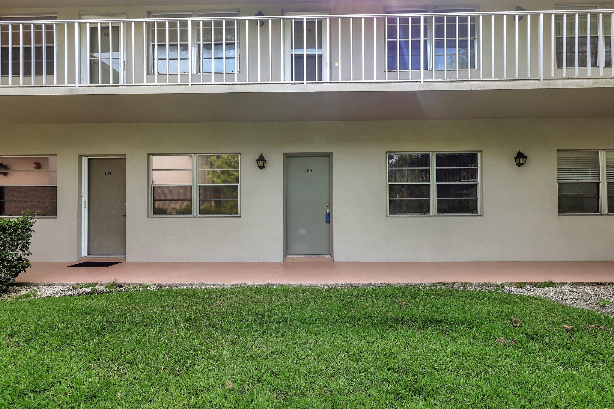 a front view of house with yard