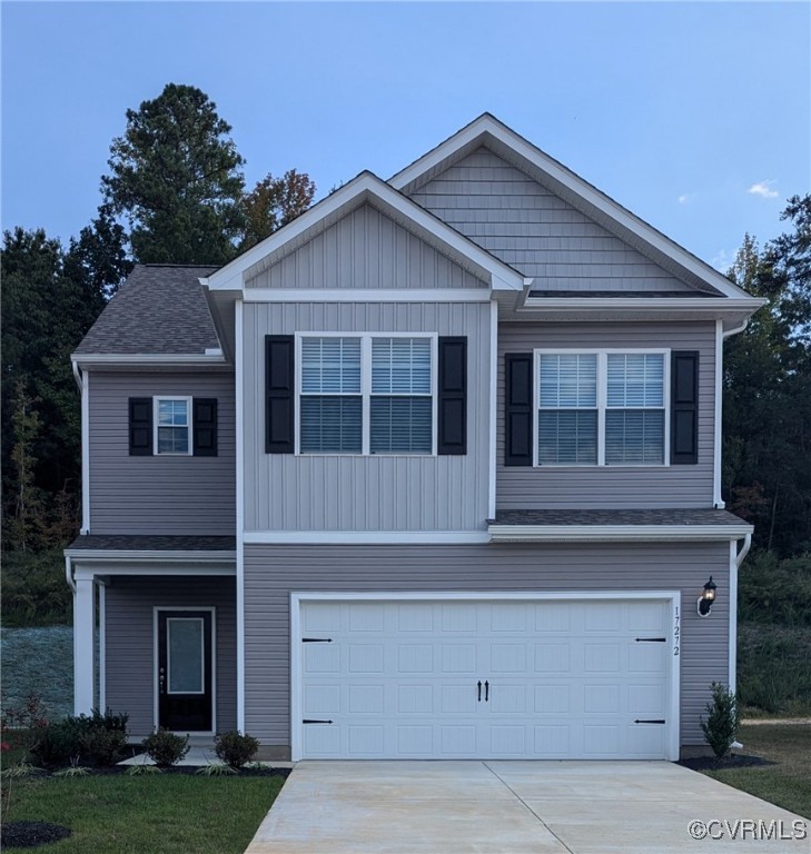 View of front of home with a garage