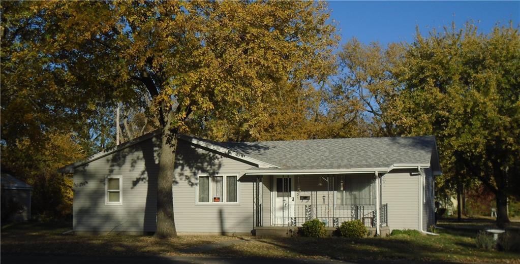 front view of a house with a street