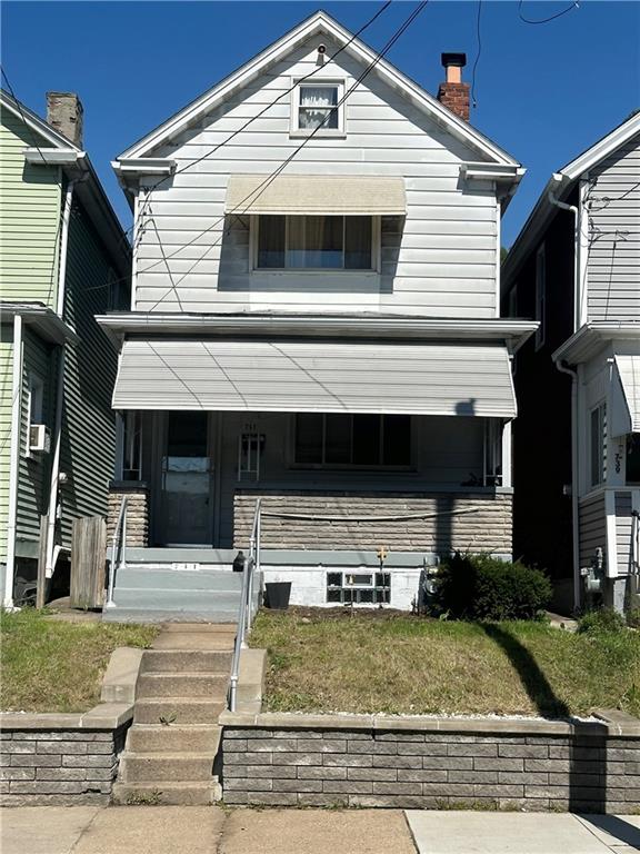 a view of a house with a balcony