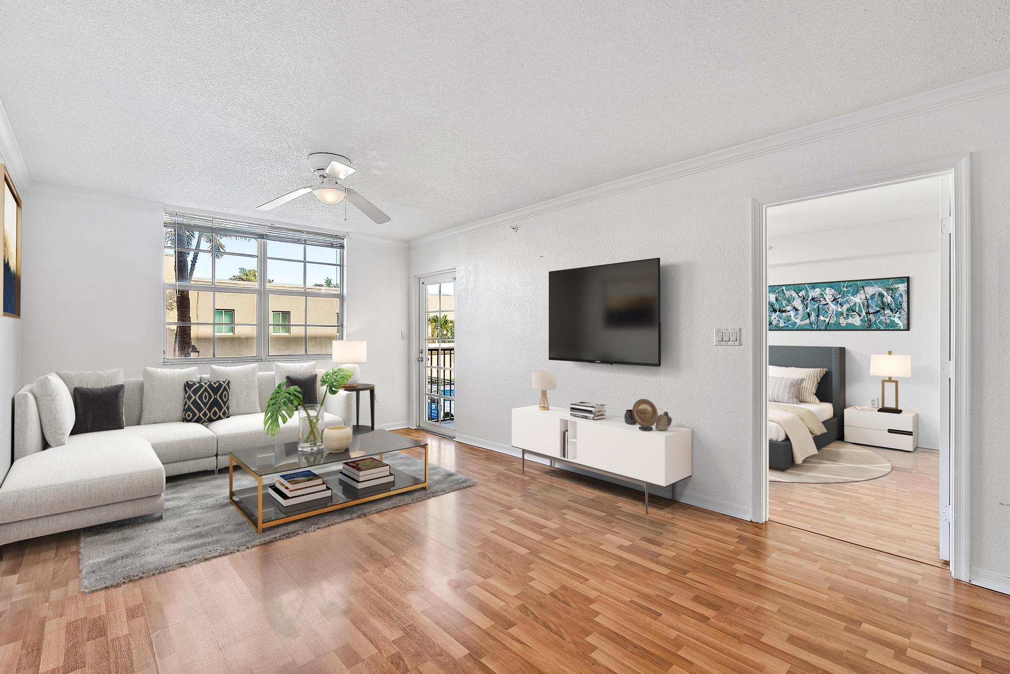 a living room with furniture and a flat screen tv