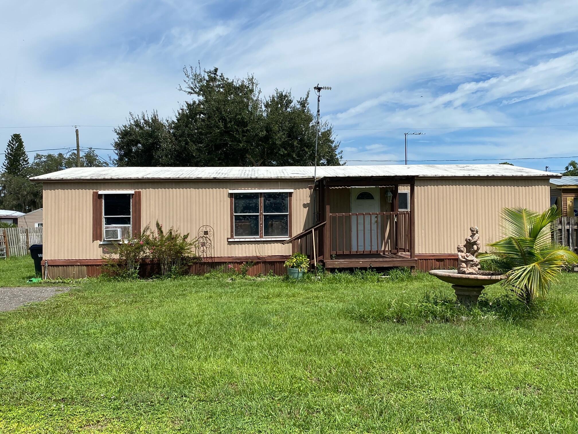 a view front of house with backyard and garden