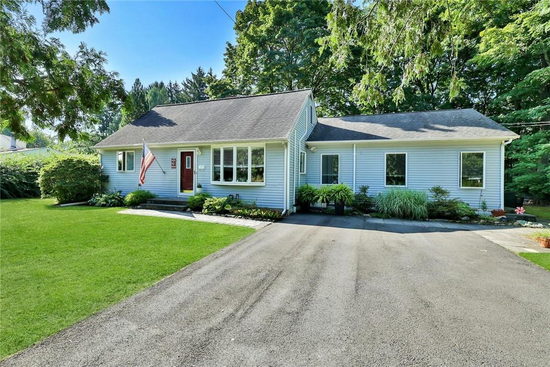 front view of a house and a yard