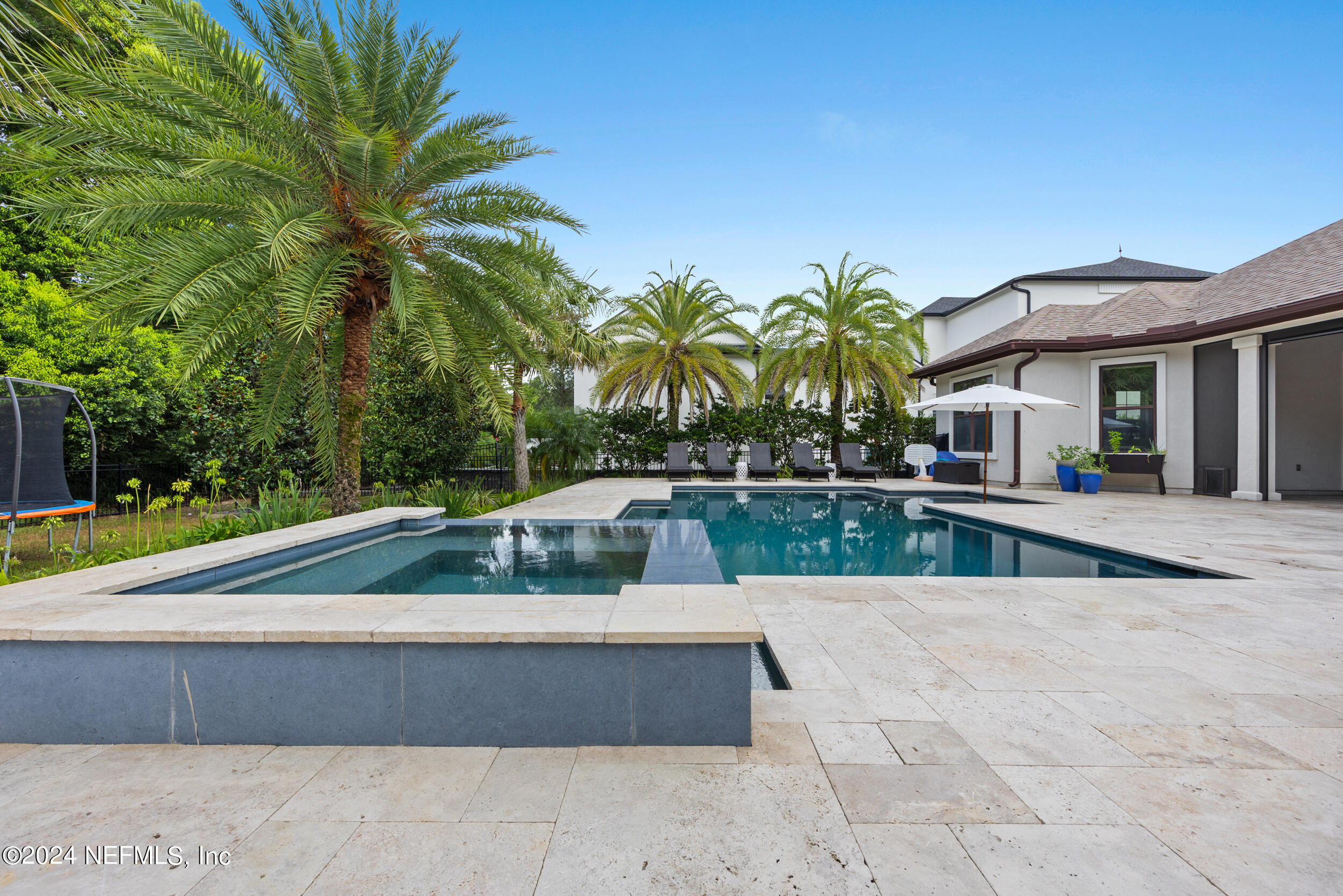 a view of outdoor space with swimming pool