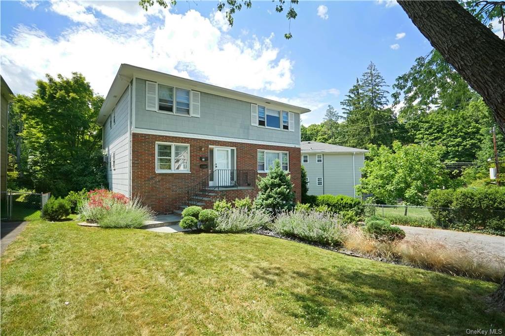 View of front of home with a front yard