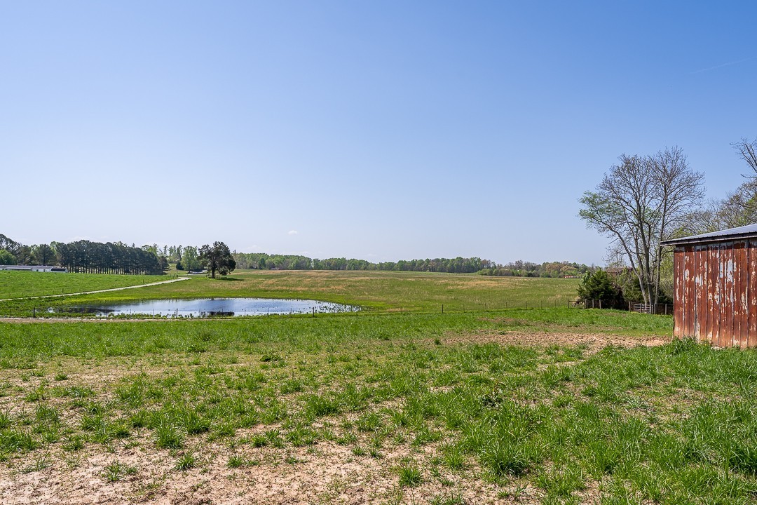 a view of a lake with a big yard