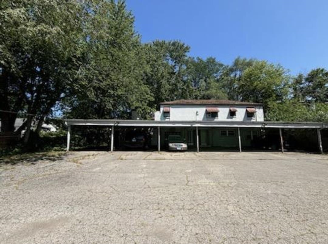 front view of house with a yard