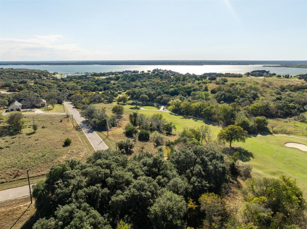 an aerial view of residential building and trees