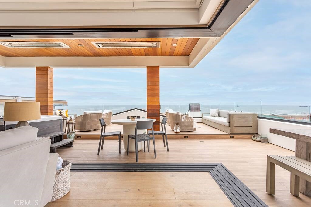 a living room with lots of furniture and a rug