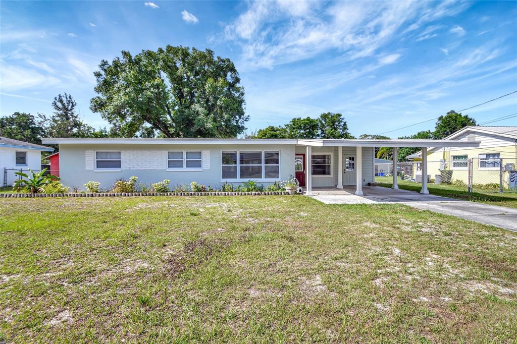 front view of a house with a yard