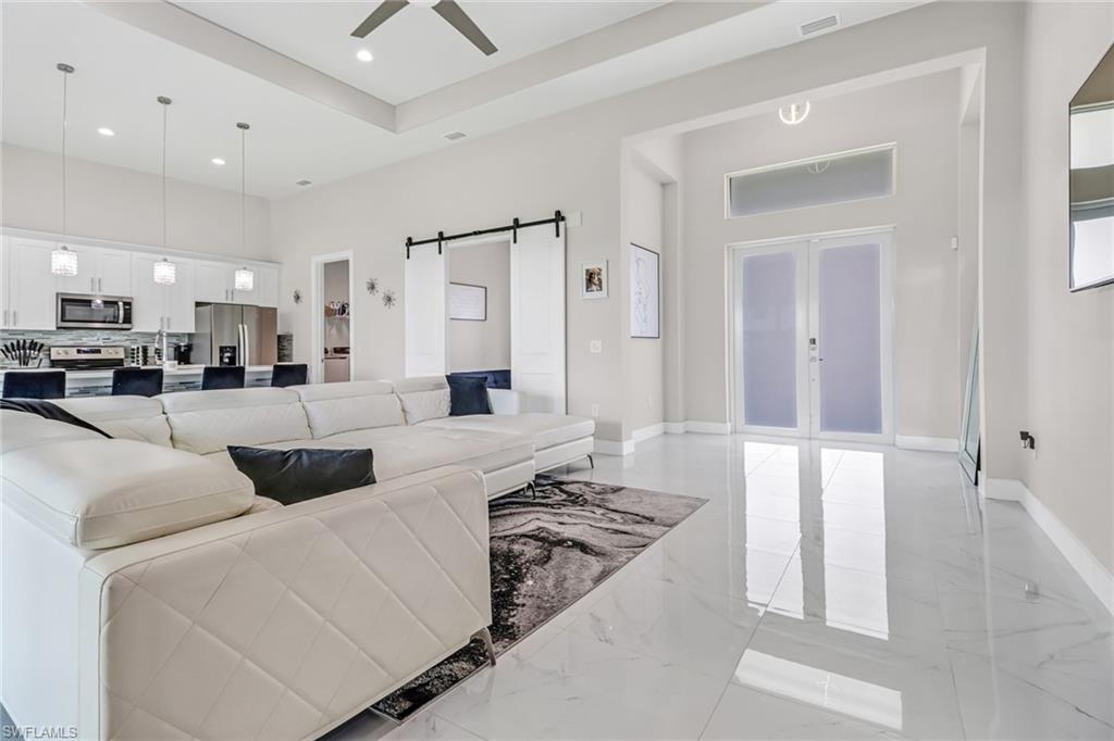 a living room with furniture and a table