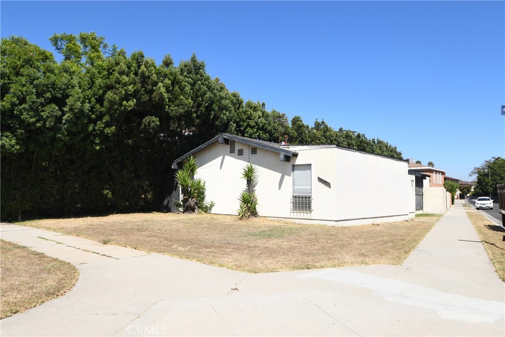 a view of large house with a swimming pool