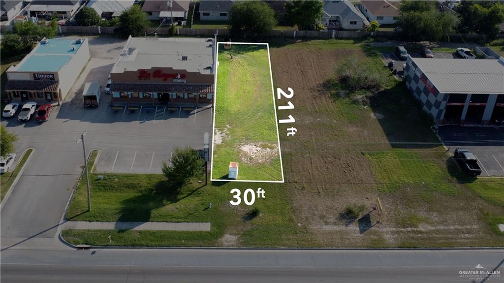 an aerial view of a house with garden space lake view and lake view