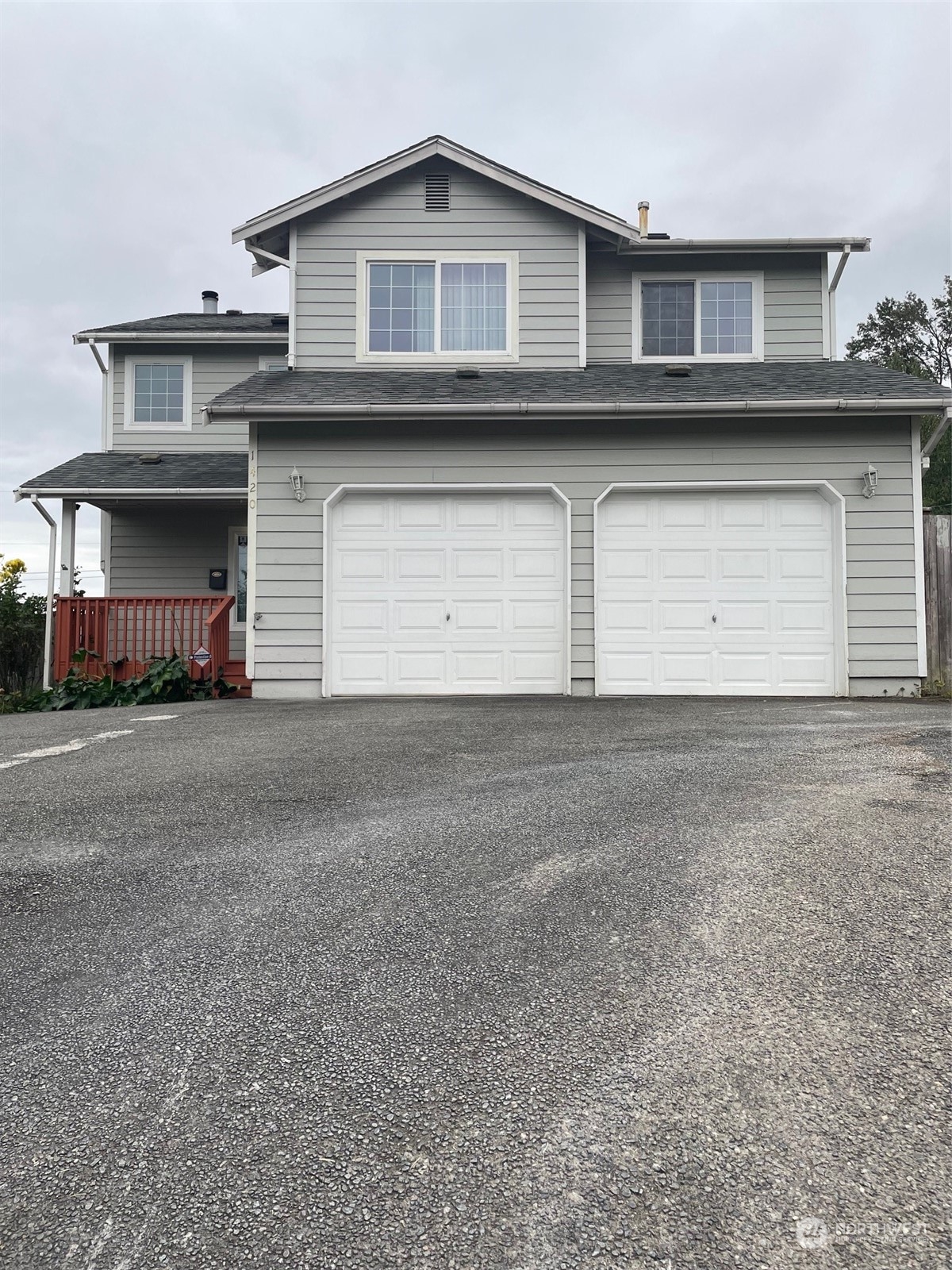 a view of a house with a garage