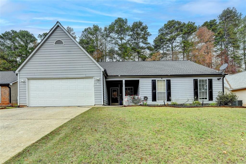 front view of a house with a yard