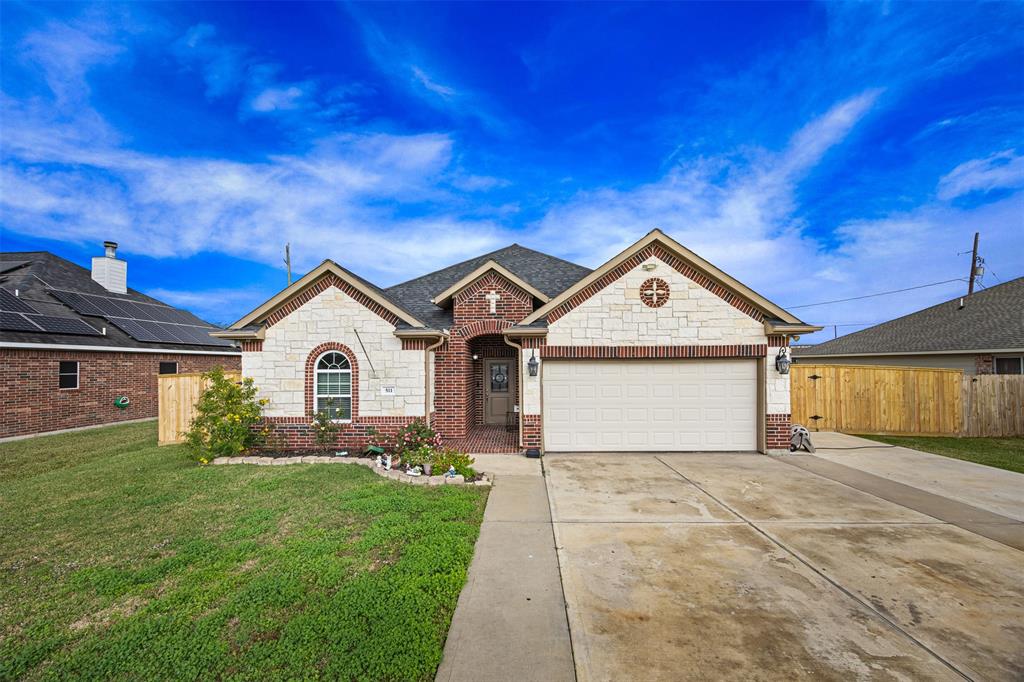 a front view of a house with yard