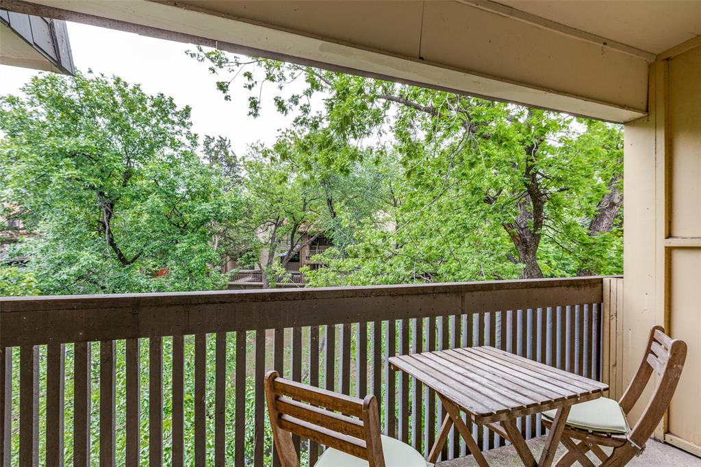 a view of a wooden bench in deck