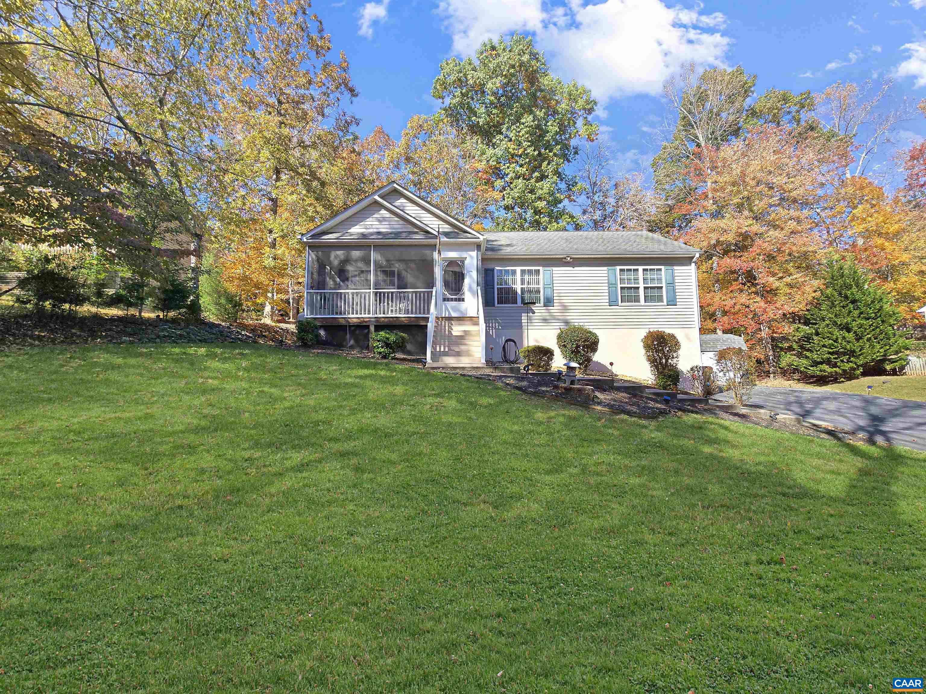 a view of a house with a big yard