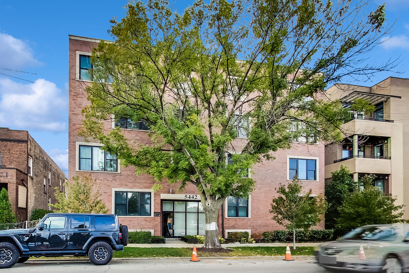 a car parked in front of a building