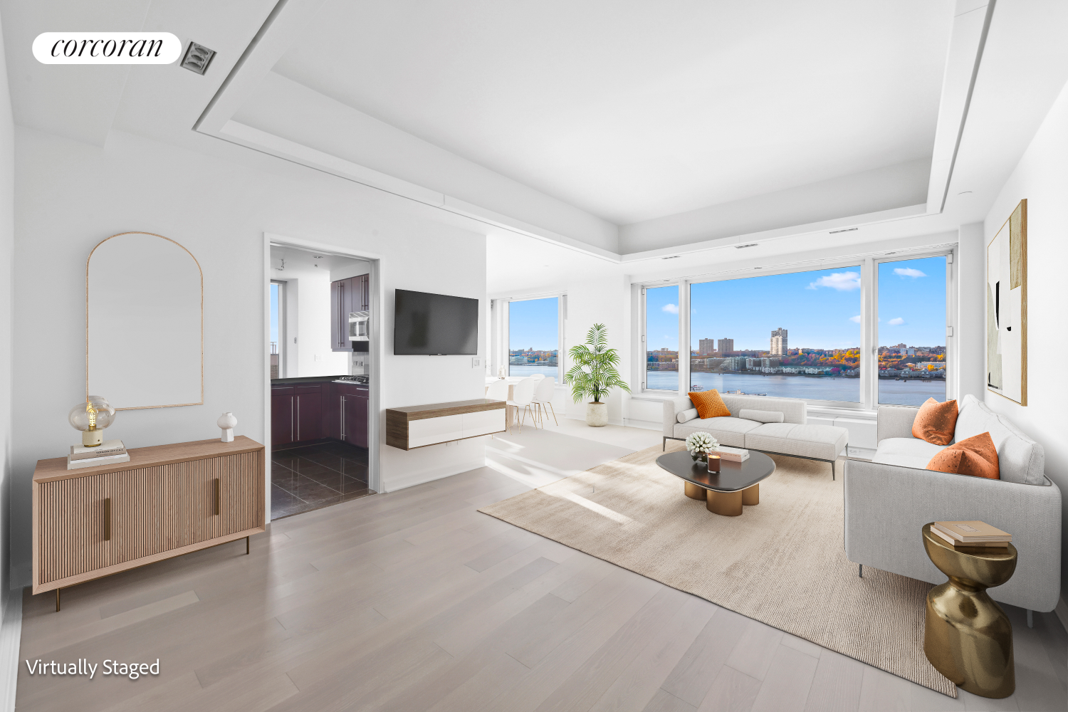 a living room with furniture and view of kitchen