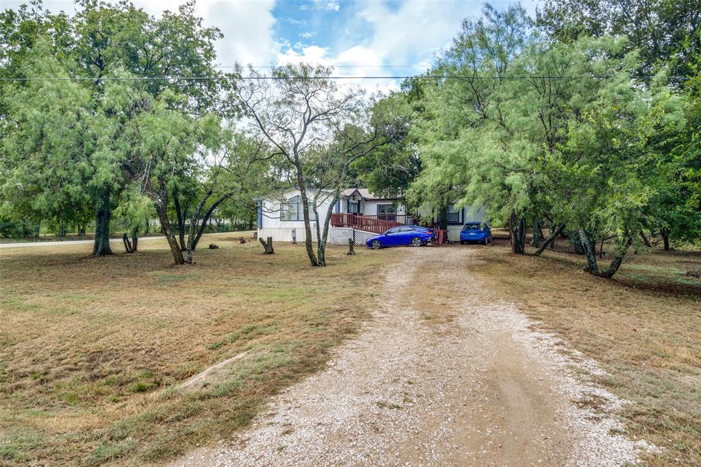 a view of outdoor space with lots of trees