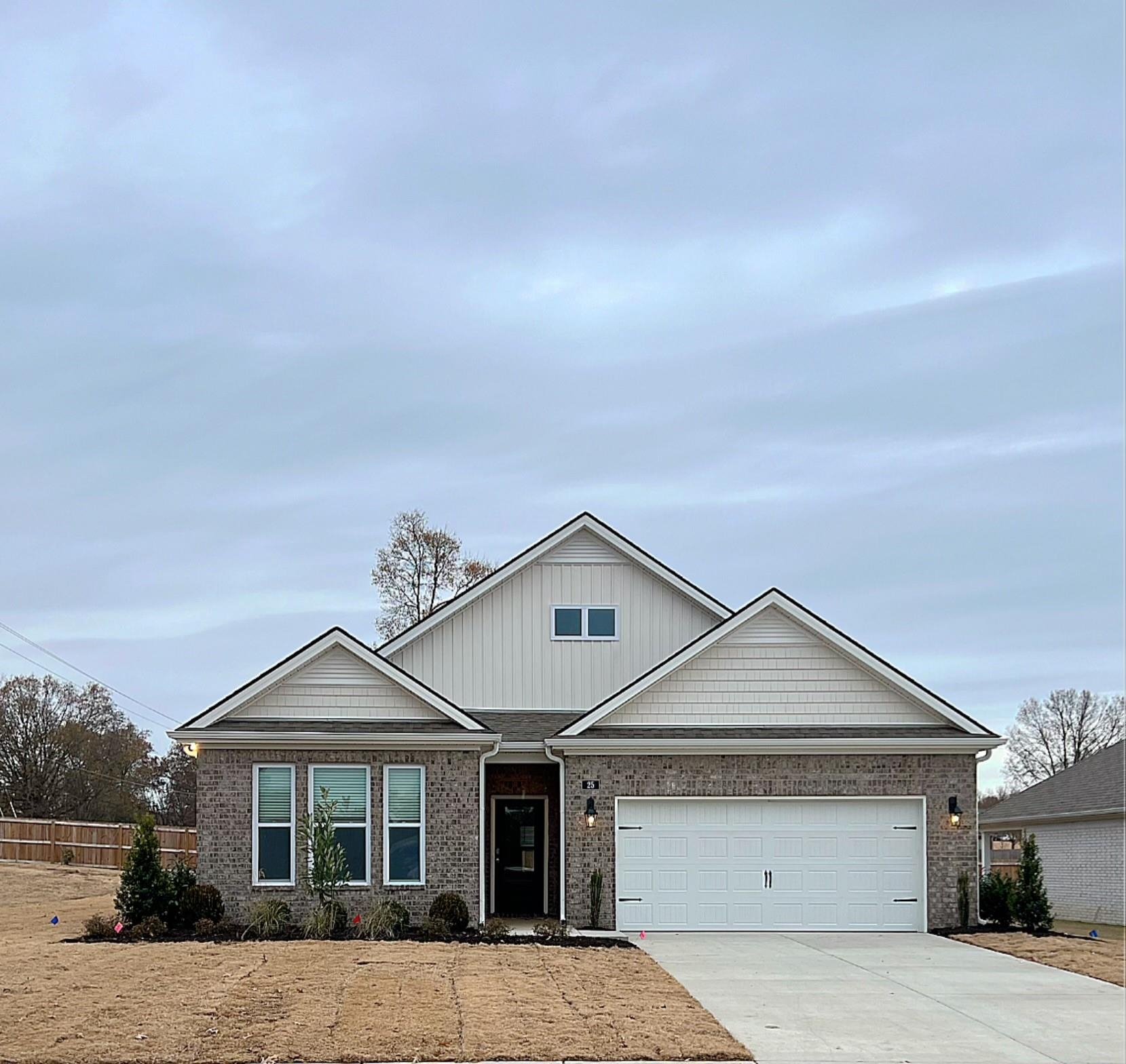 View of front of home featuring a garage