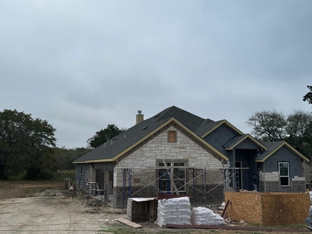 a front view of a house with a porch