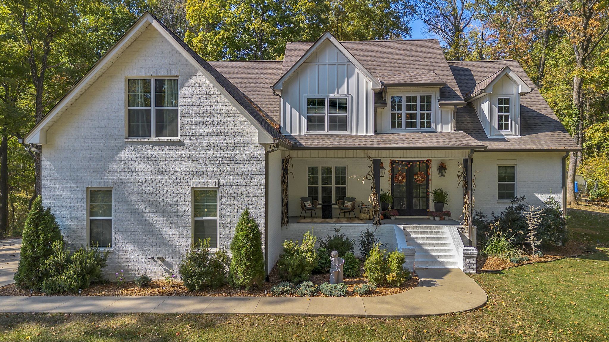 front view of a house with a yard